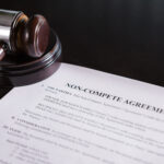 A non-compete agreement with a judges gavel